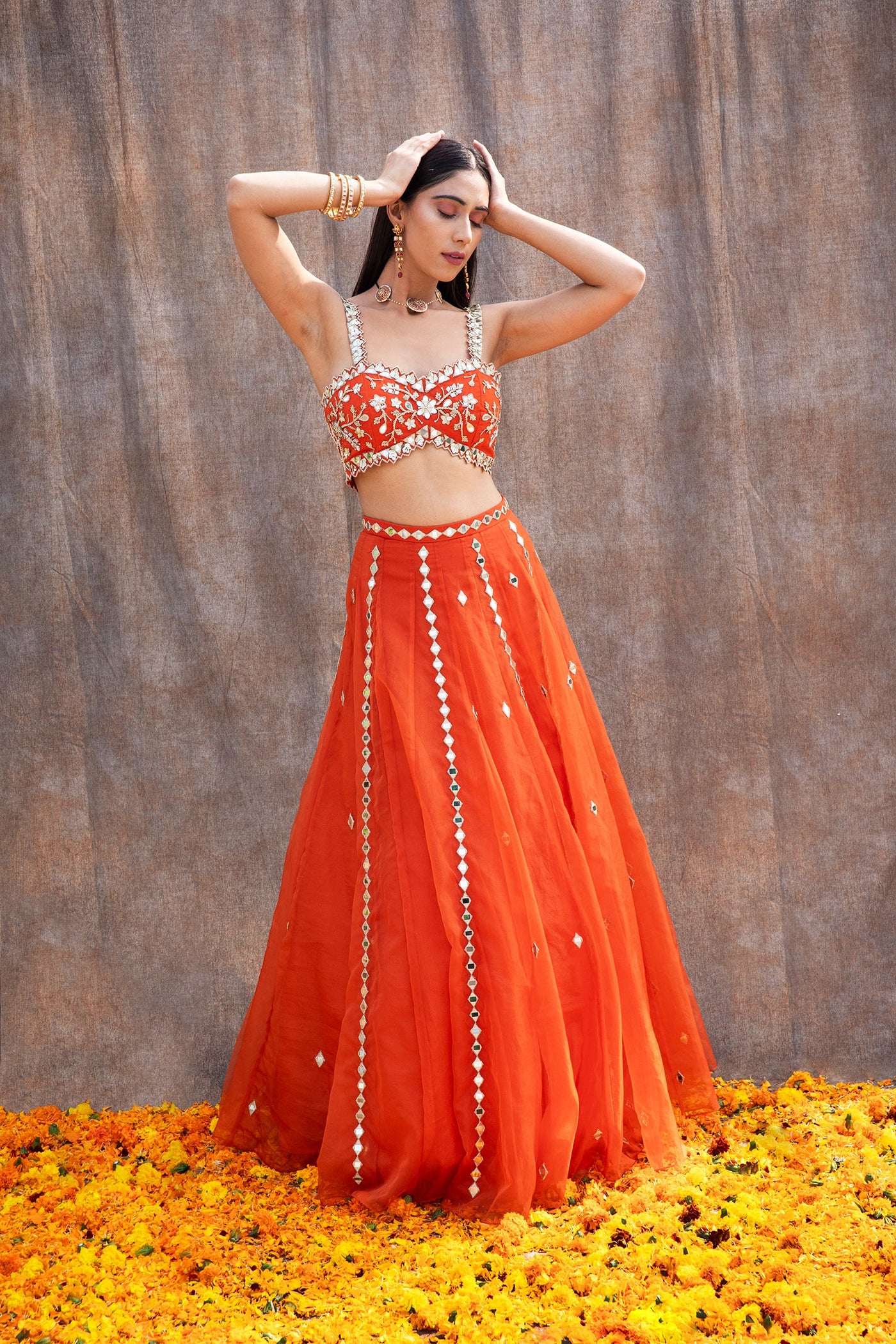 Neha Menghwani in Mirror Work V-Hem Bustier With High Waist Mirror Lines Lehenga And Embroidered Dupatta