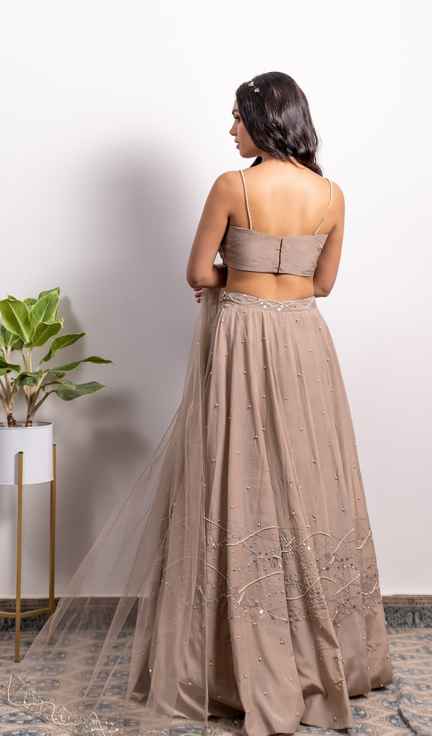 Nishtha Gandhi in Cowl Top With Embroidered Lehenga And Dupatta